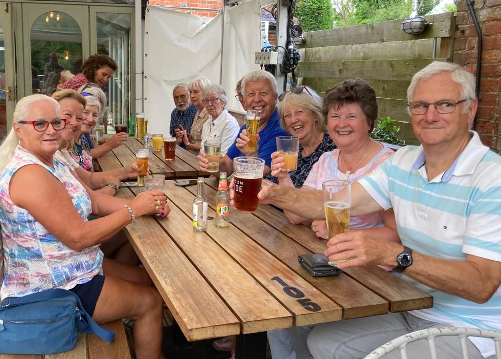 The photography group having a social drink